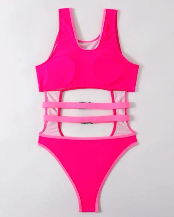 A pink swimsuit with straps on the back